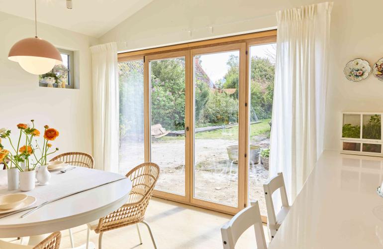 Deur in hout met pvc en houten ramen in Hasselt