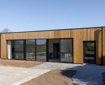 Achtergevel met schuiframen